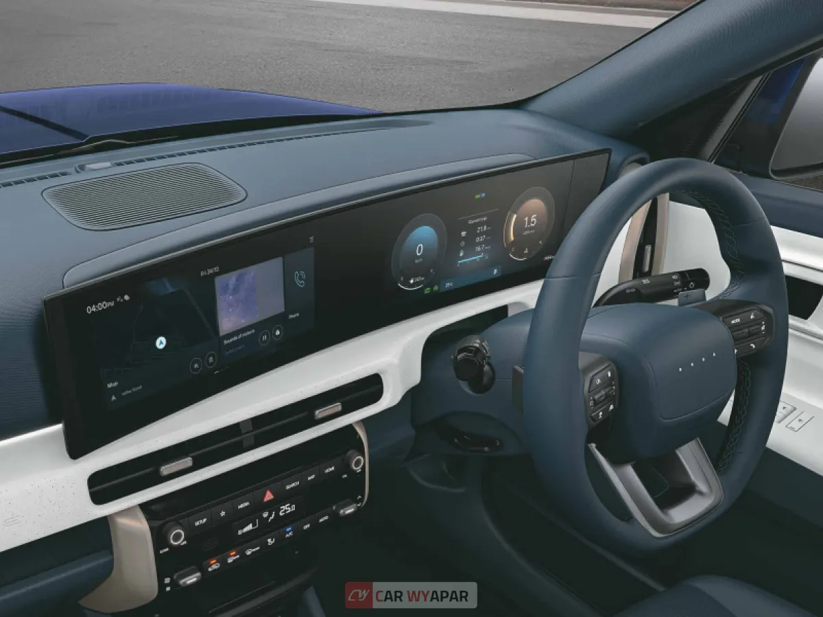Interior dashboard of the 2025 Hyundai Venue featuring the dual 12.3-inch curved panoramic displays and dual-tone Dark Navy and Dove Grey upholstery.